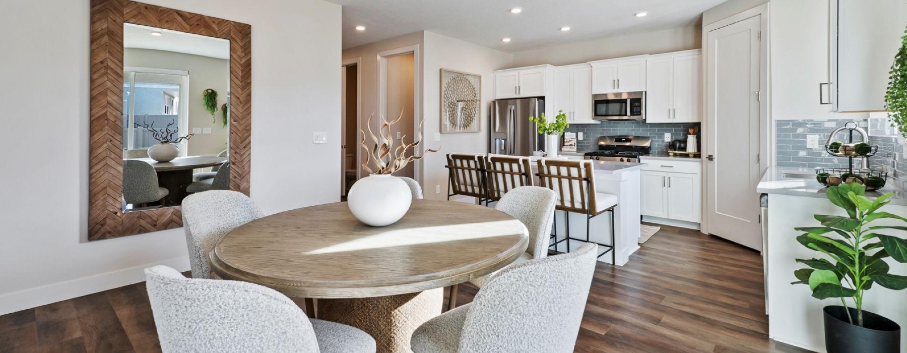 a large kitchen with a dining table
