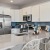 a kitchen with white cabinets