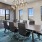 a room with a table and chairs